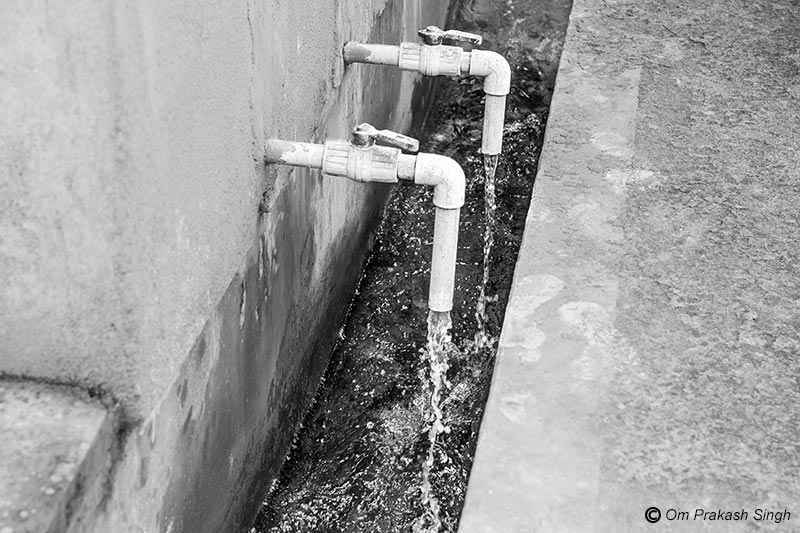 Alum and lime solutions being added to the aerated water in the water treatment plant (WTP) of a multi-village scheme under Jal Jeevan Mission in Jharkhand, India